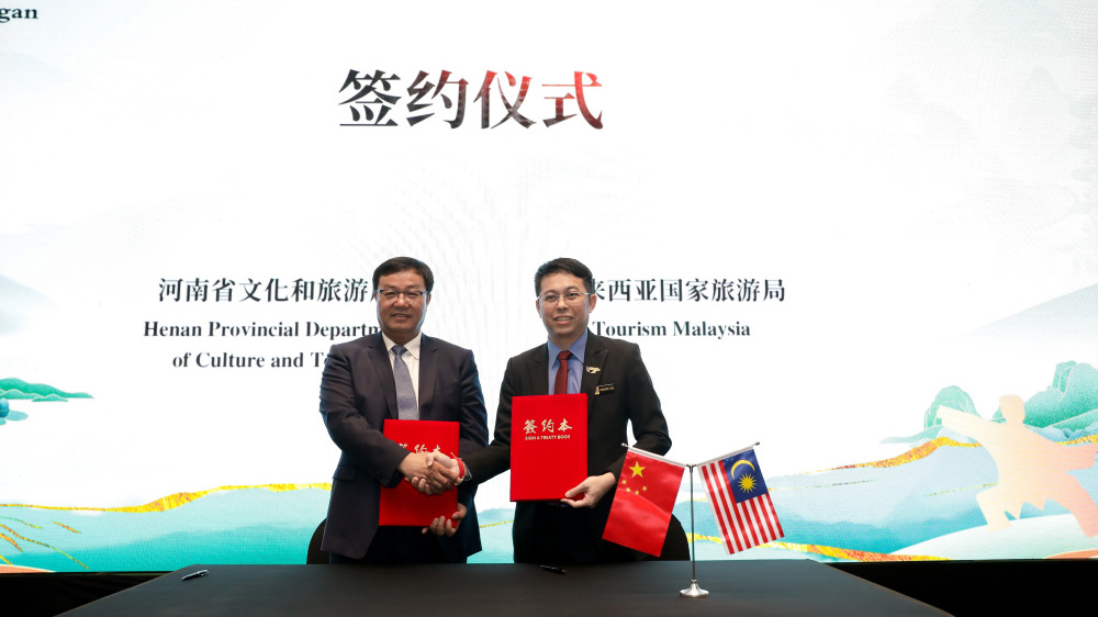 “行走河南·讀懂中國”文化旅游推介會現(xiàn)場簽約儀式.jpg